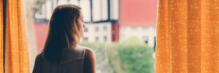 woman staring at sunset